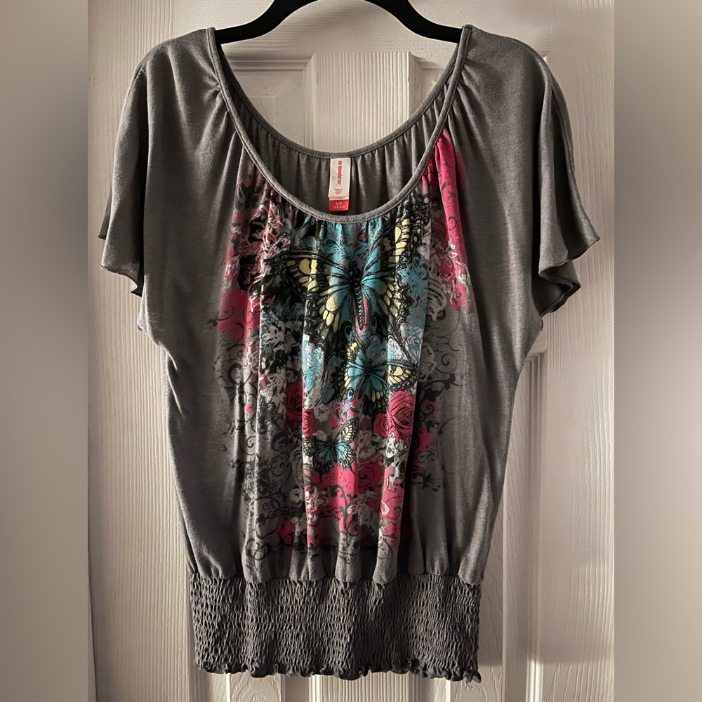 Gray top with butterfly sleeves, flower and butterfly graphic
